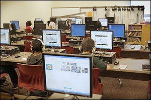 Students work in the computer lab at Pickett Academy. The building project allowed the district to make its schools more technologically up to date.