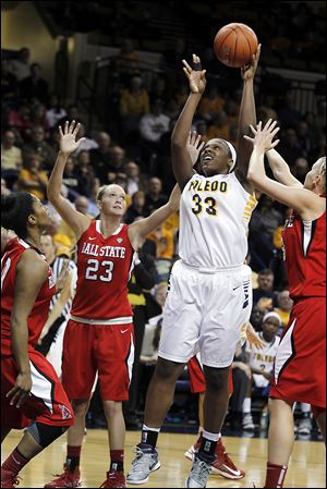 Ball State's Brittany Carter (23) is too late to stop Yolanda Richardson from getting off a shot. Richardson scored 14 points and grabbed 16 rebounds for the Rockets.