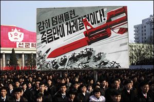 North Koreans attend a rally to support a statement given on Tuesday by a spokesman for the Supreme Command of the Korean People's Army vowing to cancel the 1953 cease-fire that ended the Korean War as well as boasting of the North's ownership of 