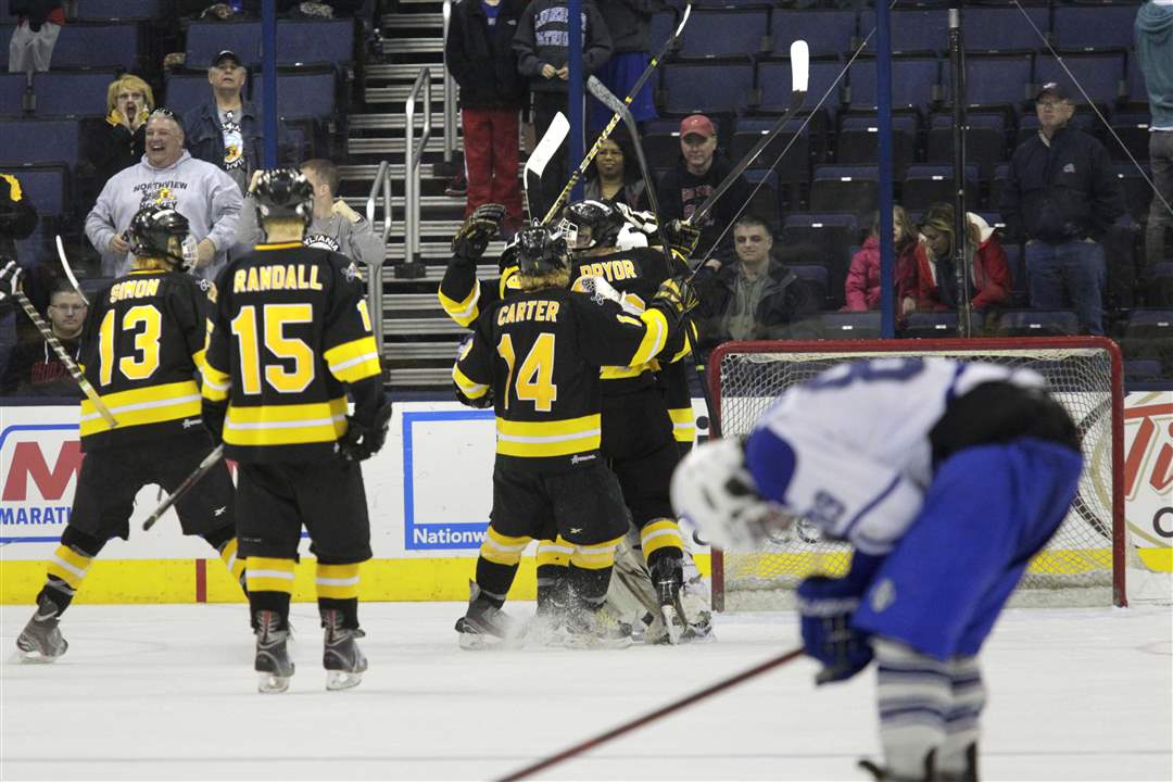 State-hockey-semis-rush-the-ice