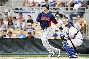 The Indians' Yan Gomes doubles against the Dodgers earlier this week. He is hitting .412 on the spring.