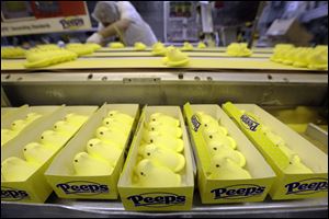 Peeps move through the manufacturing process, at the Just Born factory in Bethlehem, Pa. With the storied candy brand celebrating its 60th anniversary this year, a quirky new TV ad campaign talks about all the things people do with their Peeps.