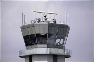 As at the air traffic control tower at Chicago's Midway International Airport, looming federal budget cuts could mean the closure of nearly 240 air traffic control towers at small airports across the country.