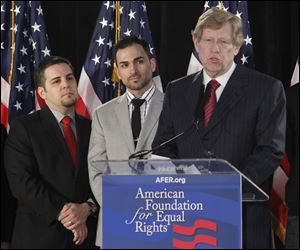 Ted Olson, right, lead Co-Counsel for the American Foundation for Equal Rights, seen with Proposition 8 paintiffs, Jeff Zarrillo, left, and Paul Katami, middle, comments on the announcement that California's same-sex marriage ban is unconstitutional during a American Foundation for Equal Rights conference in Los Angeles.