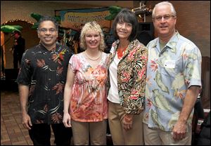 From left: Kesari and Cancy Sarikonda, and Lisa and Alan Sattler, president of the Flower Hospital, attend the ProMedical Flower Hospital Annual Medical staff dinner at Franciscan Center at Lourdes University in Sylvania, Ohio.