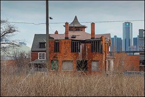 Dilapidated homes are common for a city well off its peak of 1.85 million people in the 1950 Census.