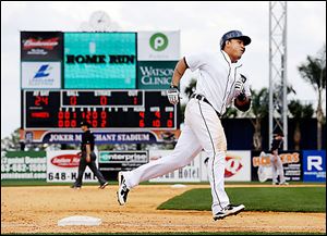 Detroit’s Miguel Cabrera rounds third base after hitting a home run against the Yankees.