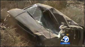 This video frame curtesy KABC TV Los Angeles shows a crash of an SUV in Action, Calif. on Sunday.