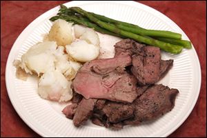 Lamb with potatoes and asparagus.