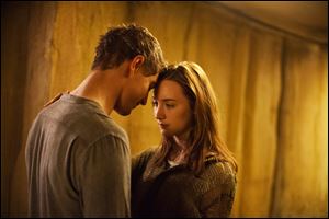 Max Irons, left, and Saoirse Ronan in a scene from 