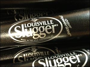 Louisville Slugger is rolling out a new logo for the first time in 33 years on a new bat that company officials say is designed to be the hardest wooden bat ever produced at the Kentucky factory.