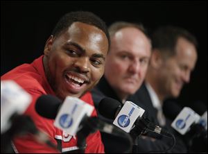 Ohio State's Deshaun Thomas smiles during a news conference in Los Angeles, Friday, March 29, 2013. The Junior forward announced today his plans to enter the NBA draft.