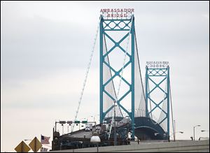 Manuel Moroun, owner of the Ambassador Bridge, has sued to block building of a second span.