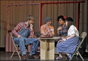 ‘State Fair'  castmates from left: Nolan Duly (who plays Able), Payton Lechner (Lena), Chandler Horton (Clara), and Katie Taylor (Henrietta) rehearse a scene for the musical at Rossford High School.