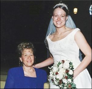 Rachel Valis, the chairman of the the Northwest Ohio American Foundation for Suicide Prevention Chapter-in-Formation, right, and her mother, Dolores Schroeder at Rachel's wedding in 2003. Mrs. Schroeder committed suicide. Family handout.