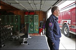 Lt. Chris Nye stands in the temporary station’s garage. Response times are not delayed because of the current setup, he said. Business owners in downtown Sylvania did not express worries. 