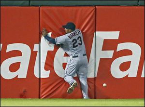 Cleveland left fielder Michael Brantley is unable to catch an RBI double by Chicago's Hector Gimenez in the fourth inning.