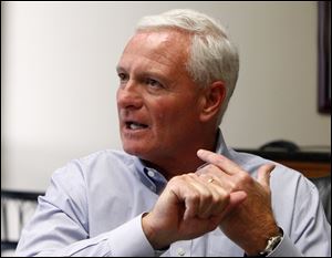 Jimmy Haslam, CEO of Pilot Flying J and owner of the Cleveland Browns, speaks during a news conference at the company headquarters in Knoxville, Tenn. When federal agents descended on the Knoxville headquarters of Pilot Flying J on April 15, it was the first inkling the public and company executives had of an FBI and Internal Revenue Service investigation that began nearly two years ago. The privately held company with $31 billion in annual revenues is run by CEO Jimmy Haslam, who also owns the NFL's Cleveland Browns. The Haslam family, including brother Tennessee Gov. Bill Haslam, holds a majority stake.