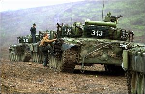 Russian tanks take position near the town of Bamut in the province of Chechnya in 199 during the second Chechen war.