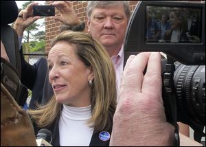 Elizabeth Colbert Busch, the sister of political satirist Stephen Colbert, speaks to the media after voting Tuesday, May 7, 2013, in Charleston, S.C. Colbert Busch, 58, is running against Former South Carolina Gov. Mark Sanford for the 1st District congressional seat. (AP Photo/Bruce Smith)