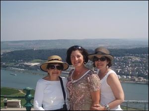 This 2012 photo provided by Anne D’Innocenzio shows her on the right with her sister Donna in the middle and mother Marie on the left in Rudesheim, Germany.