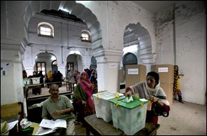 A woman casts her ballot today in Rawalpindi, Pakistan.