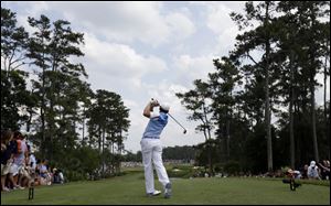 Sergio Garcia, of Spain, hits from the fourth tee during the third round of The Players championship golf tournament at TPC Sawgrass today in Ponte Vedra Beach, Fla.