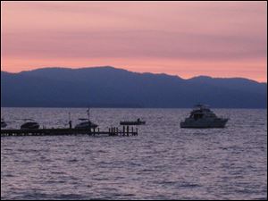 Sunset falls in South Lake Tahoe, Calif., near the Nevada border. A Native American leader from Nevada recently appointed to the U.S. Commerce Department’s national tourism advisory board says tribes need to learn more about how to tap into the interest travelers have shown in American Indian heritage and the culture and history of the West.