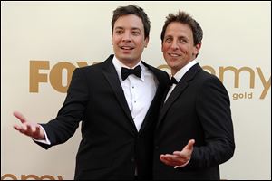 Seth Meyers, right,  is moving from his 'Weekend Update' desk to his own late night show on NBC. He will replace Jimmy Fallon, left, at the 12:35 a.m. 'Late Night' show as Fallon moves up an hour as Jay Leno's replacement on the 'Tonight' show. 