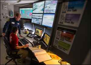 Jon Parker stops in the Command Center at the BP Husky refinery.