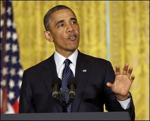 President Barack Obama speaks on the Internal Revenue Service's targeting of conservative groups for extra tax scrutiny in the East Room of the White House in Washington.