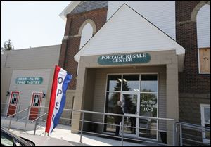 A customer enters a resale center in Port Clinton. Despite the illusion of prosperity given Ottawa County's proximity to the lake, much of that county’s employment is either seasonal or part time. 