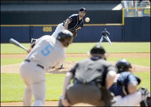 Syracuse's Chris Rahl makes contact on a pitch from Mud Hens starter Derek Hankins.