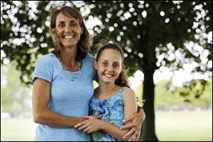 Samantha Schofield, a fifth grader at Fallen Timbers Middle School, standing with her mother, Janet, will be competing in the Scripps National Spelling Bee.