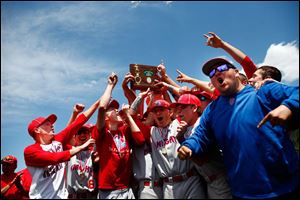 St. Francis players celebrate winning the Division I District Final 4-0 over Clay.