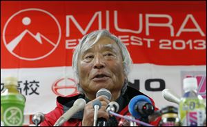 Yuichiro Miura, an 80-year-old Japanese mountaineer who became the oldest person to reach the top of Mount Everest last Thursday, speaks during a press conference at CLARK Memorial International High School in Tokyo today.