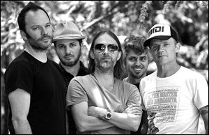 Members of Atoms For Peace, from left, Nigel Godrich, Joey Waronker, Thom Yorke, Mauro Refosco, and Flea.