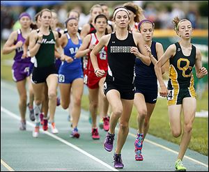 Courtney Clody of Perrysburg races to a victory in the 1600 meters.