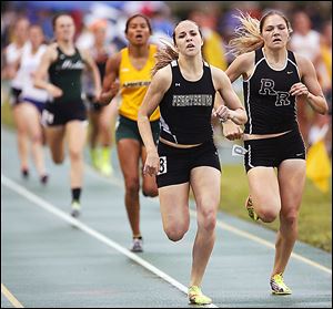 Emily Wyrick of Perrysburg wins the 800 meter run at the Division I regional track meet.