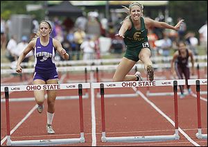 Evergreen's Carly Truckor wins the 300-meter hurdles.