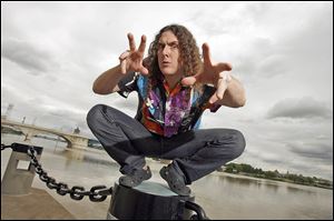 'Weird Al' Yankovic poses by the Maumee River for Blade photographer Andy Morrison in 2008.