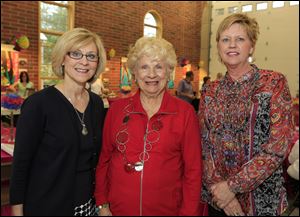 From left, Mary Westphal, Marie Vogt, and Kellie Holeman at the Distinguished Artist Hall of Fame gala party in Sylvania.