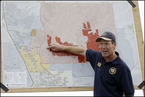 Incident Commander Rich Harvey gives an update on the Black Forest Fire during a news briefing in Colorado Springs, Colo., Friday.