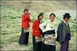 Tibetan pilgrims perform the 32-mile long circumambulation of the sacred Mount Kailash in western Tibet.