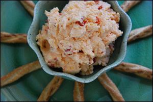 Classic Pimento Cheese Spread is perfect with pretzels, crackers, or a sliced baguette, or as filling for a grilled sandwich.