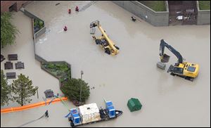 Flood waters surround the hospital  in Canmore, Alberta, Canada. 