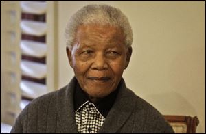 This 2012 file photo shows former South African President Nelson Mandela during the celebration of his 94th birthday in Qunu, South Africa. Mandela is in 'critical' condition at a South African hospital where he was admitted for a recurring respiratory infection.