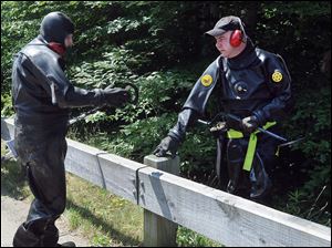 State police continue their search for evidence along Homeward Lane where New England Patriots tight end Aaron Hernandez resides.