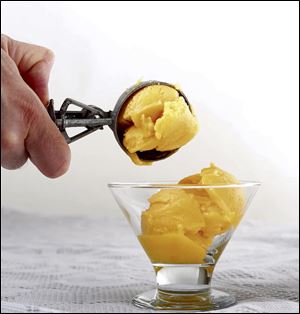 A scoop of mango sorbet.