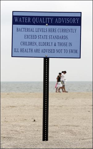 Maumee Bay State Park posts signs to alert beach-goers when water quality is compromised by excessive bacteria and algae.